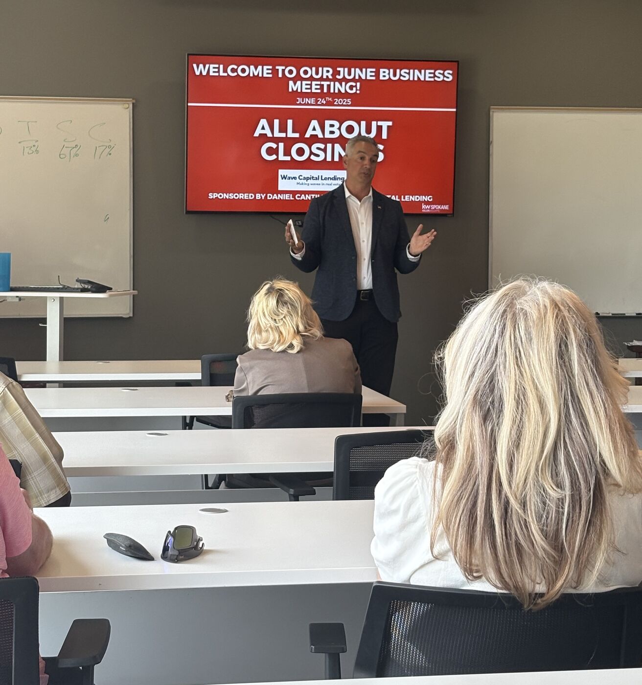 Dan Cantillana presenting All About Closings at a Spokane business meeting