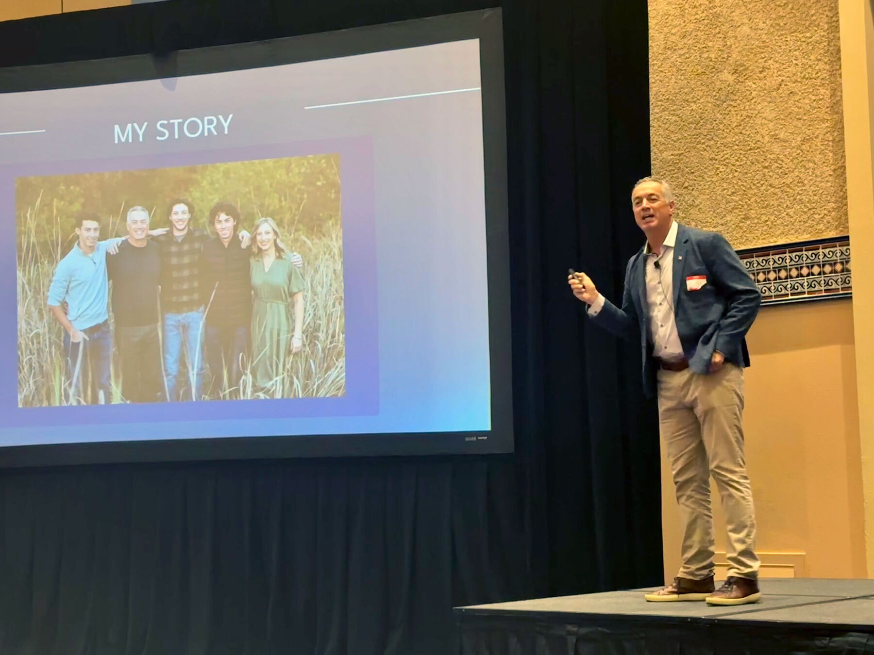 Dan Cantillana speaking on stage